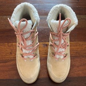 Sorel tan suede and shearling boots.